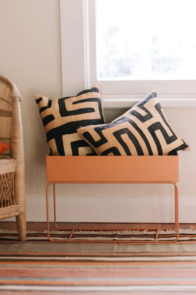 Terracotta Metal Planter filled with cushions