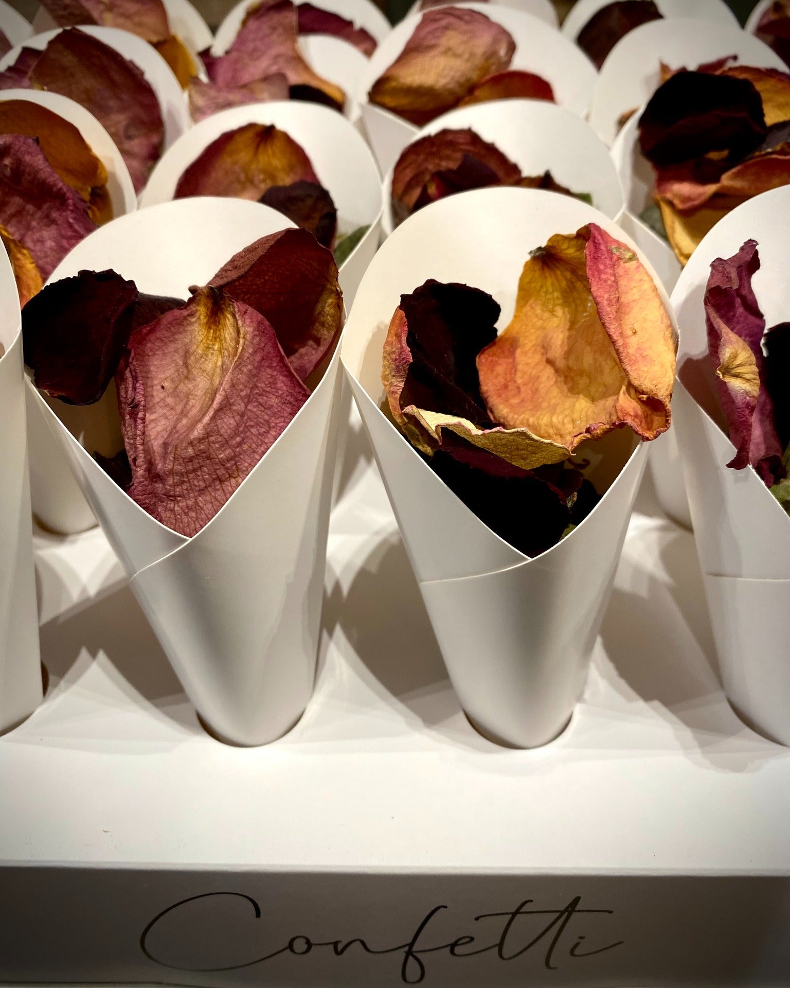 Natural wedding confetti made from dried rose petals