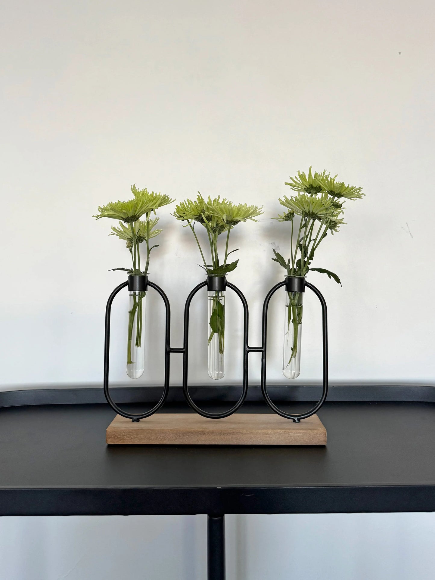 Triple Bud Vase with green flowers