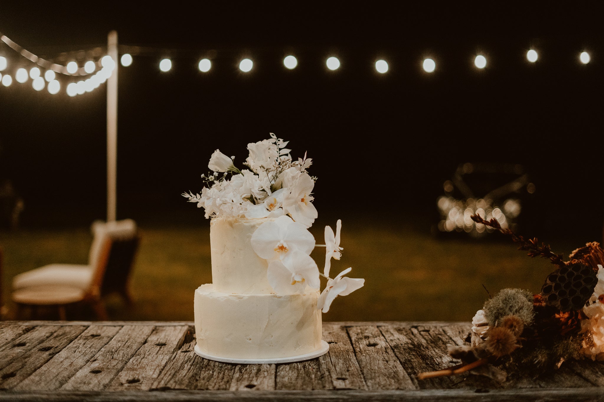 Wedding cake with orchids on top