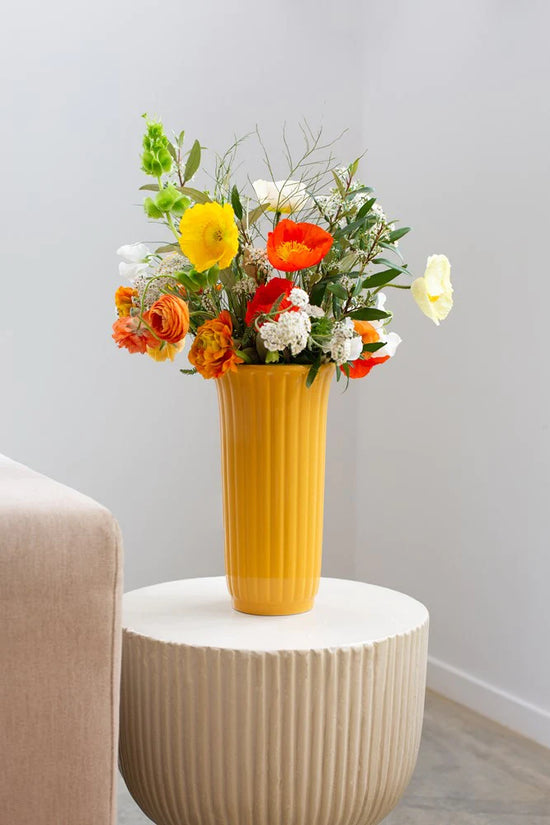 Yellow Vase of fresh flowers