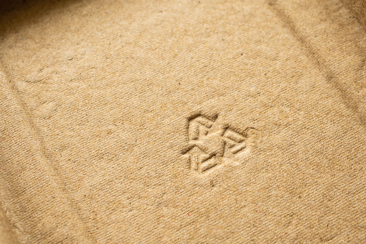 Close up of the recycle symbol on cardboard