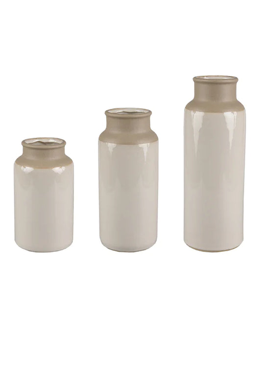 Three ceramic potter vase bottles in small medium and large sizes
