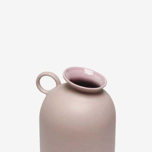 Pink ceramic vase close-up