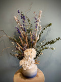 Beautiful dry flower arrangement in vase