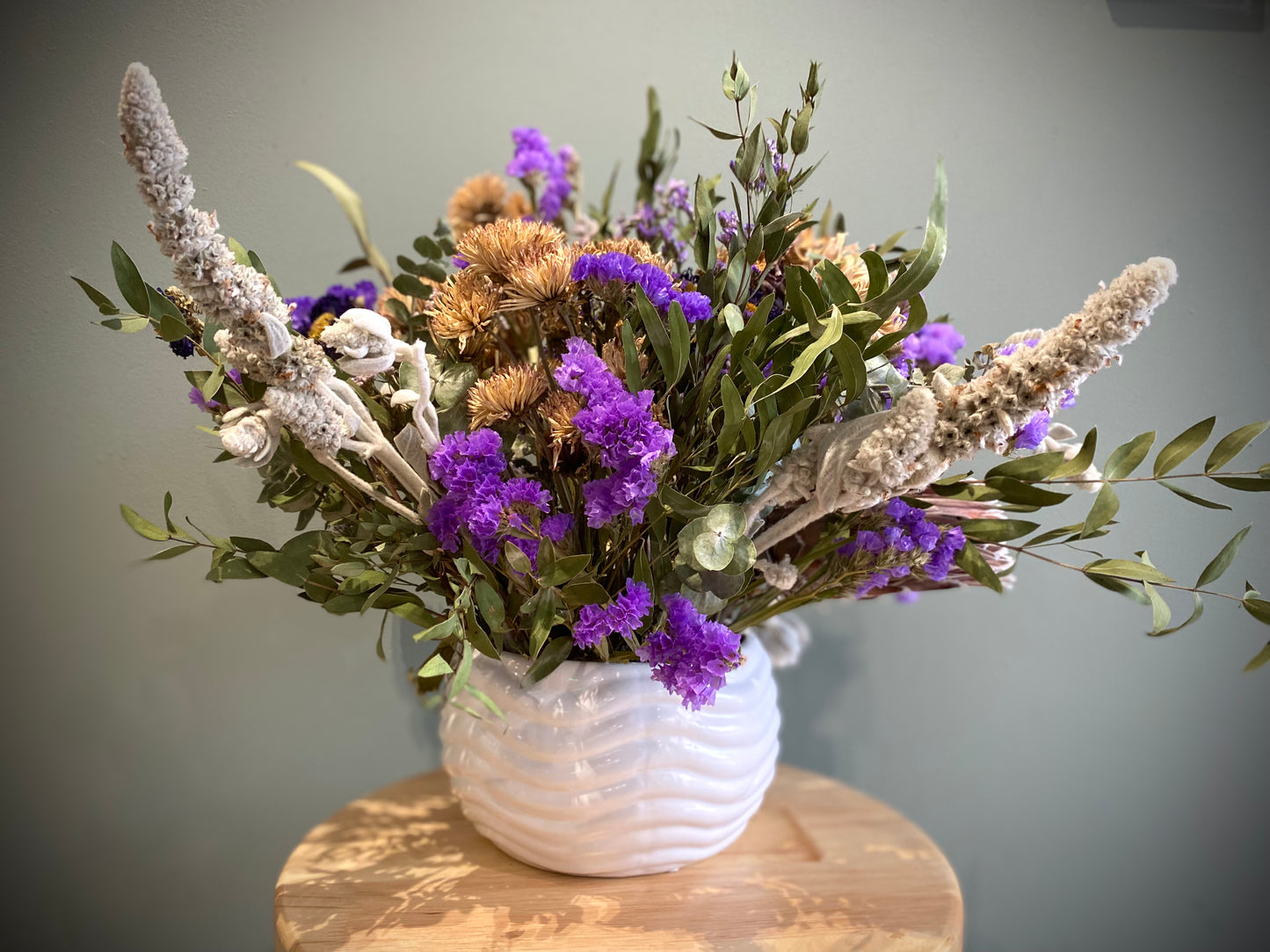 Dried flower arrangement in purple