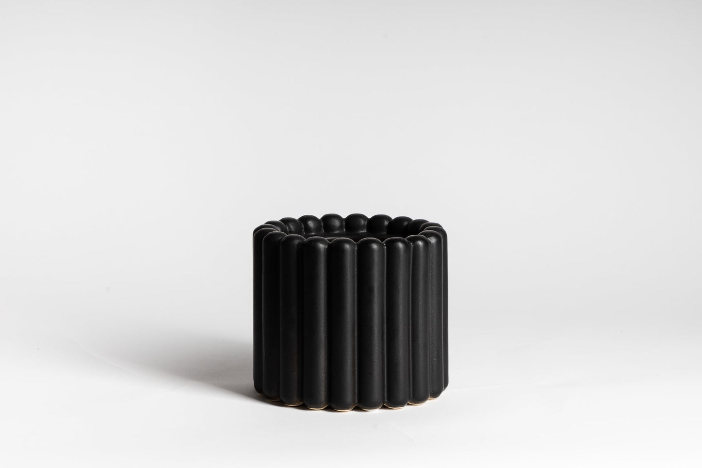 Black ceramic plant pot